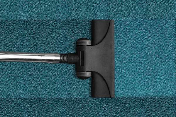 aspirateur tapis bleu